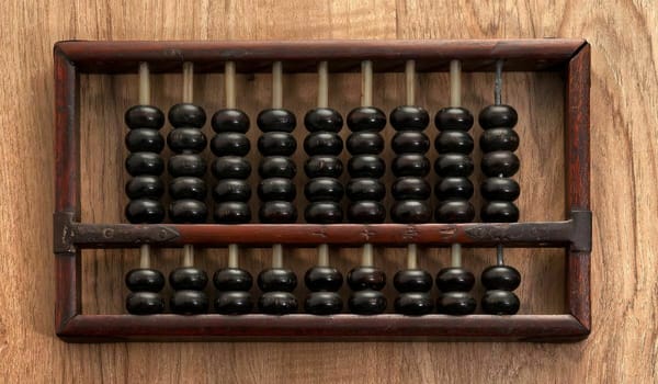 An abacus on a wooden background